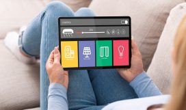 Smart home, saving electricity, controlling level of lighting, ventilation sound and climat Smart home, saving electricity, controlling level of lighting, ventilation sound and climat. Mature woman lies on sofa and adjusts systems for comfort at house on tablet with icons, double exposure